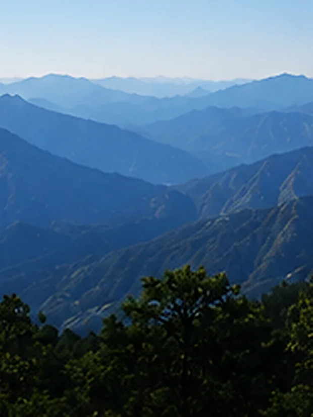 Mountain ranges fading into blue haze
